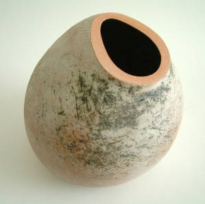 Flintform 5. Press moulded ironstone withapplied vitreous white slip, oxide and green lead glazed interior. 2003